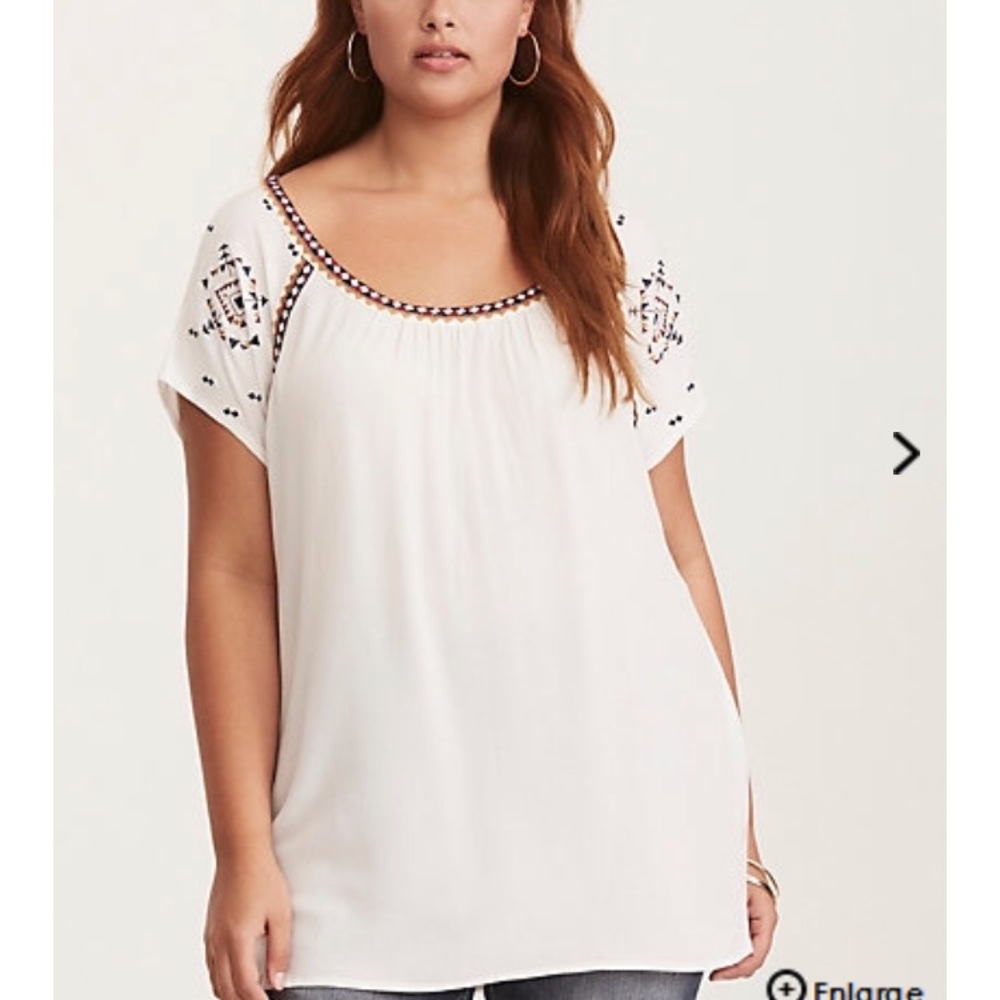 NWT. Embroidered back blouse. Size 2.